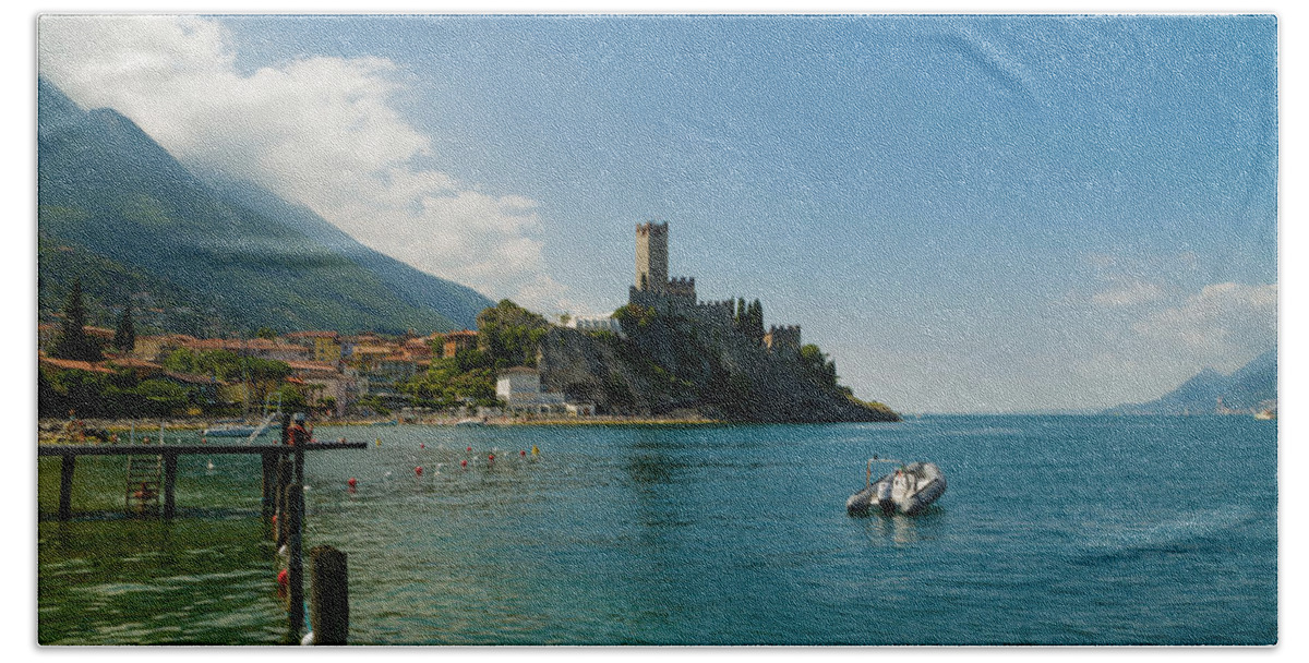 Lake Beach Towel featuring the photograph Castle of Malcesine, view from the beach by Nicola Aristolao