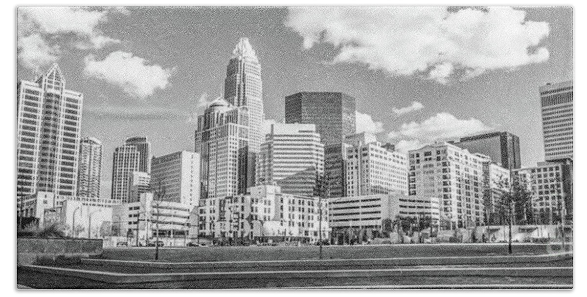 121 West Trade Beach Towel featuring the photograph Charlotte Skyline Panorama Black and White Image by Paul Velgos