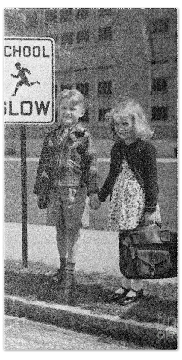 1930s Beach Towel featuring the photograph Children Next To Slow Traffic Sign by H. Armstrong Roberts/ClassicStock