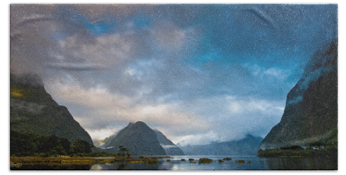 Background Beach Towel featuring the photograph Cloudy morning at milford sound at sunrise by U Schade