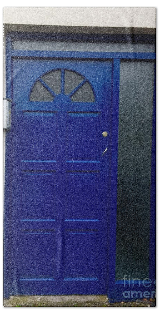 Blue Beach Towel featuring the photograph Crooked blue door in Ireland by Suzanne Lorenz