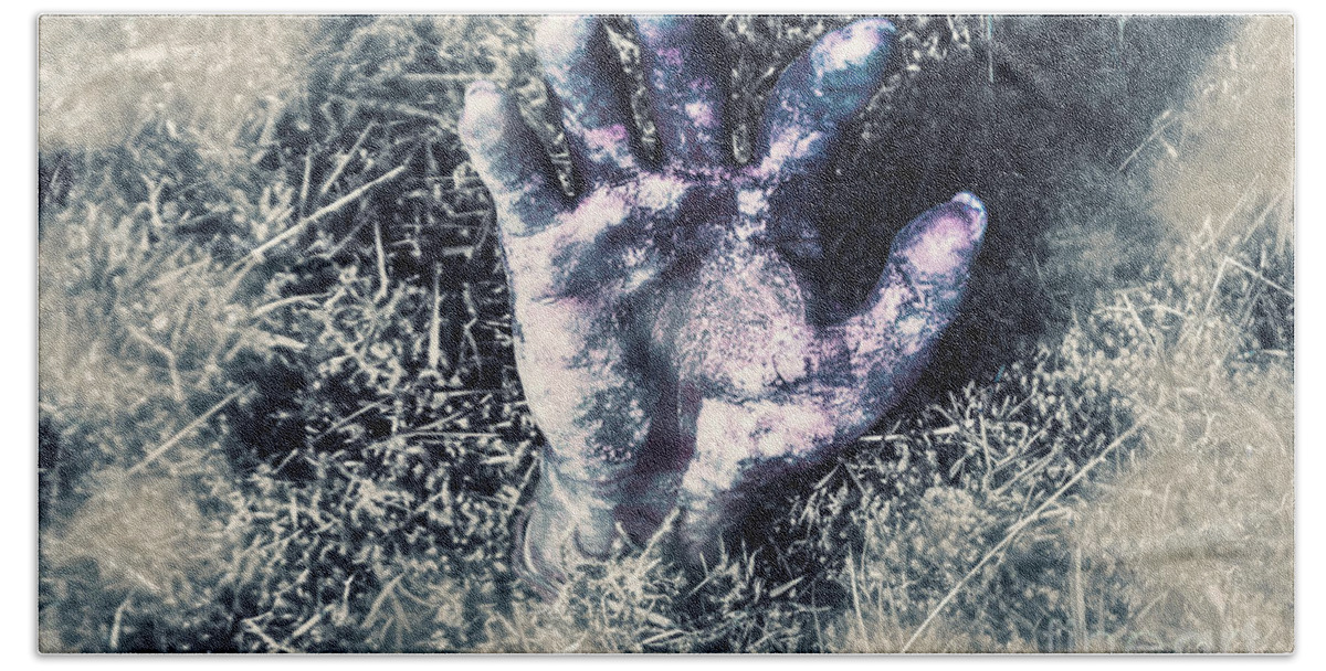 Horror Beach Towel featuring the photograph Decaying Zombie Hand Emerging from Ground by Jorgo Photography