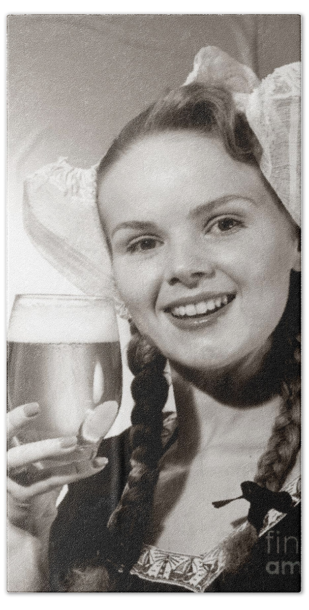 1940s Beach Towel featuring the photograph Dutch Woman With Beer, C.1950s by Coleman/ClassicStock