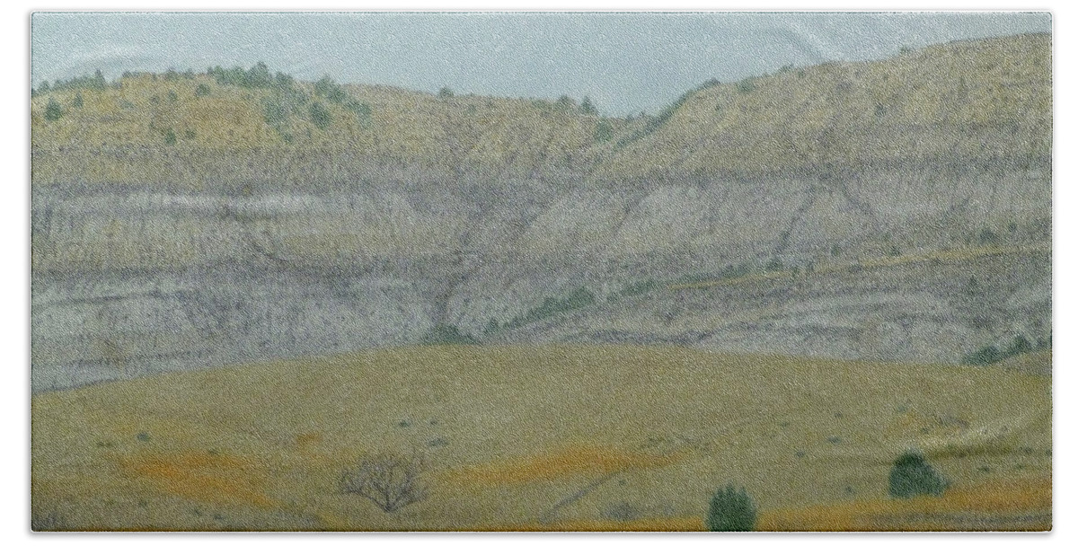 North Dakota Badlands Beach Towel featuring the pastel Early May on the Western Edge by Cris Fulton