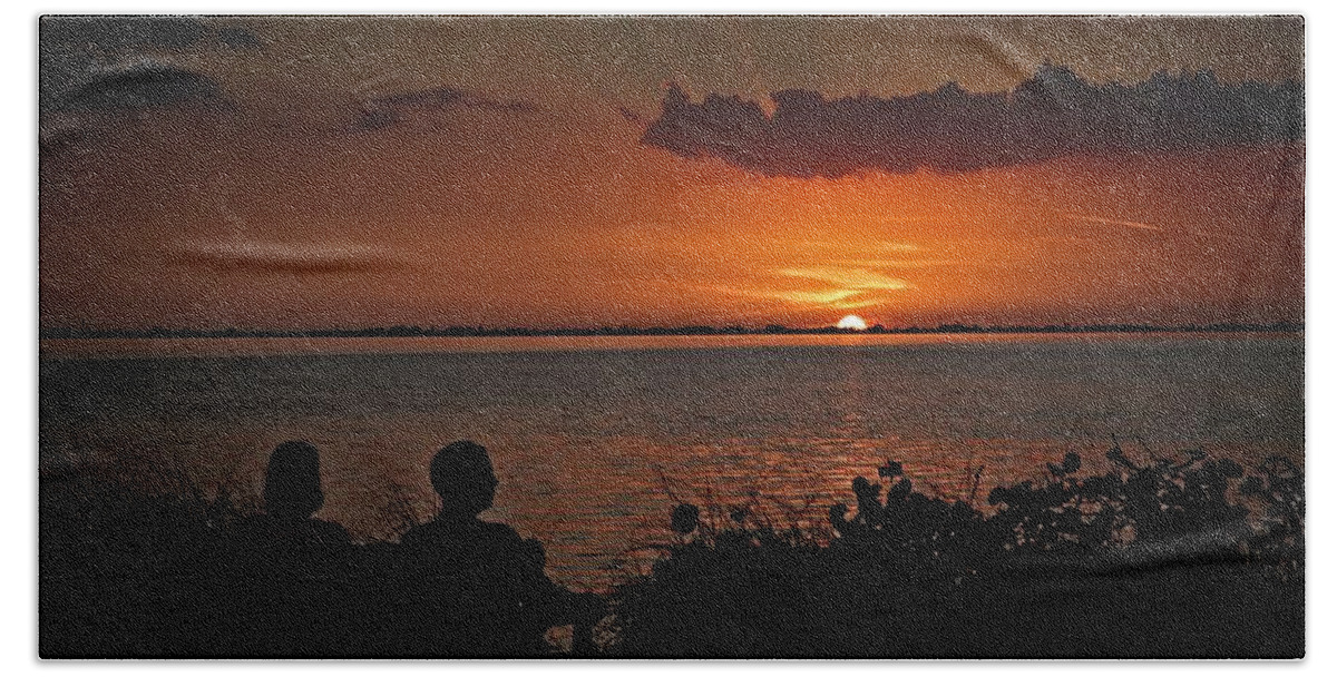 Sunset Beach Towel featuring the photograph Enjoying The Sunset by Ronald Lutz