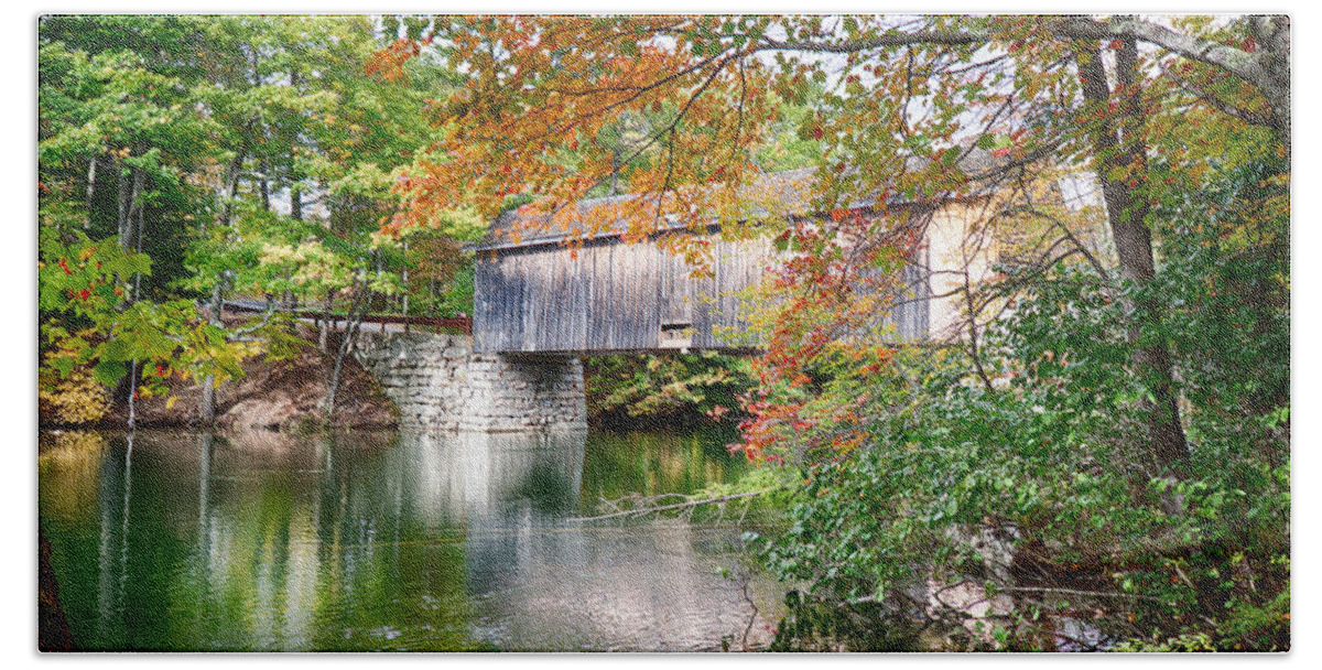 Autumn Foliage New England Beach Towel featuring the photograph Fall colors over the Babs covered bridge by Jeff Folger