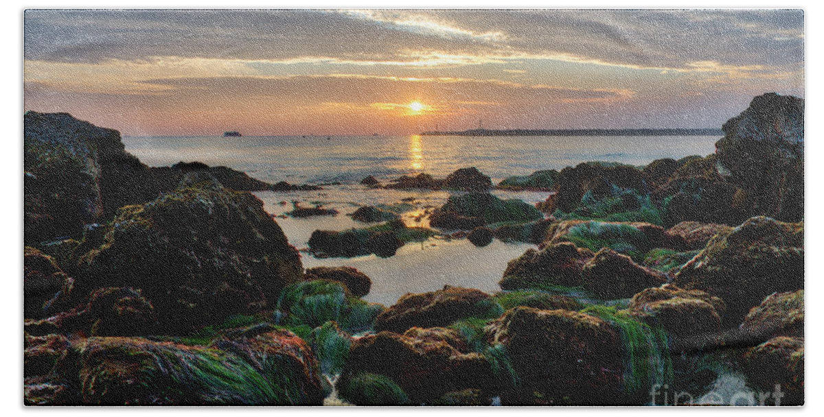 First Beach Towel featuring the photograph First Sunset of 2018 by Eddie Yerkish
