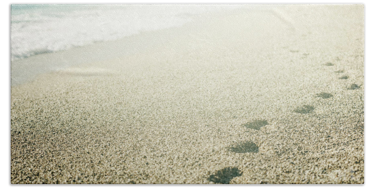 Footprints Beach Towel featuring the photograph Footprints on the beach by Jelena Jovanovic