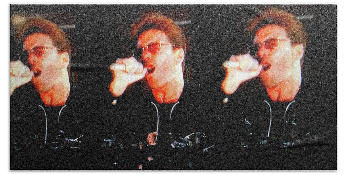 George Michael Beach Towel featuring the photograph George Michael the passionate performer by Toni Hopper