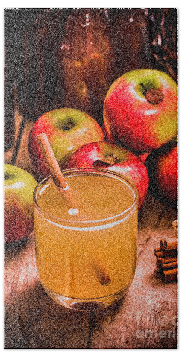 Apple Beach Towel featuring the photograph Glass of fresh apple cider by Jorgo Photography
