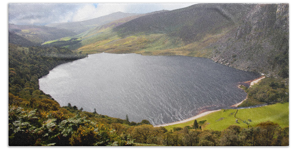 Clouds Beach Towel featuring the photograph Guinness Lake in Wicklow Mountains Ireland by Semmick Photo