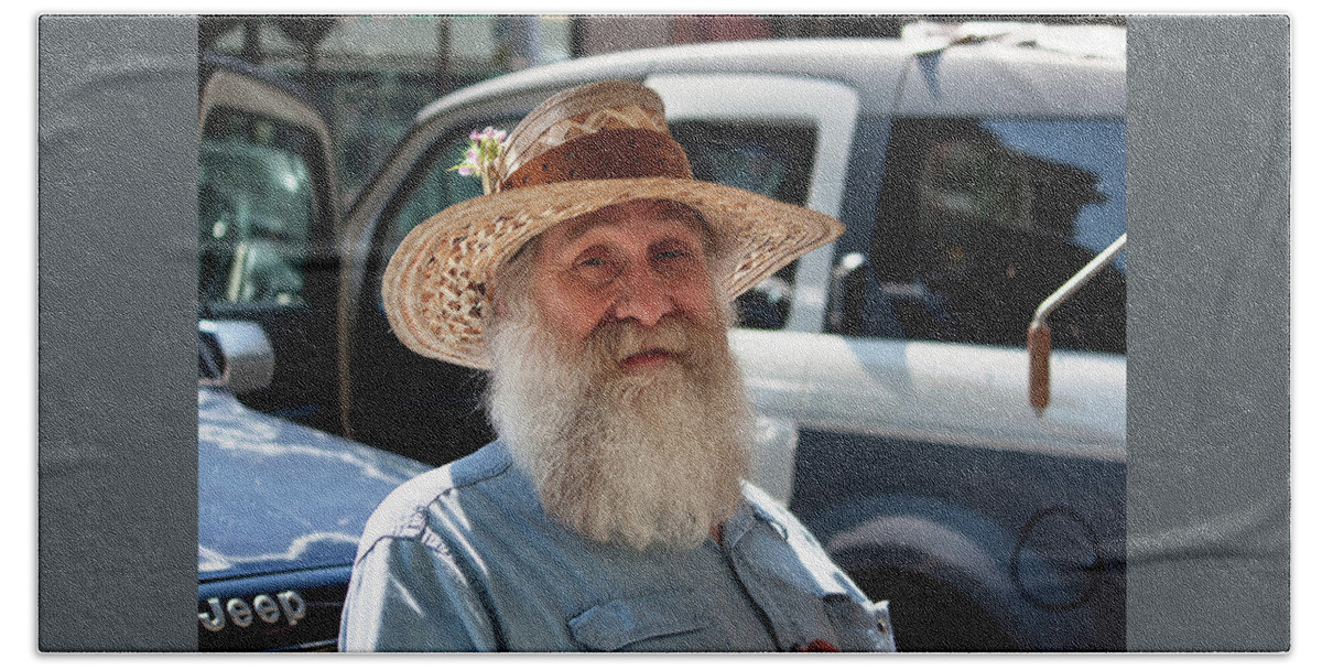 Photograph Beach Towel featuring the photograph Jerry at the Market by Suzanne Gaff
