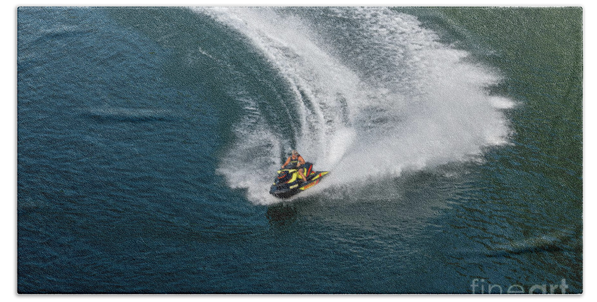 Jet Beach Towel featuring the photograph Jet ski on a dark blue water by Les Palenik