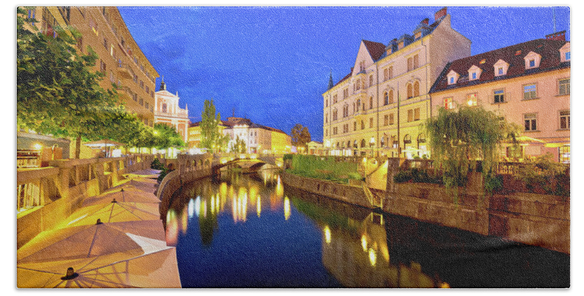 Ljubljana Beach Towel featuring the photograph Ljubljanica river waterfront in Ljubljana evening view by Brch Photography