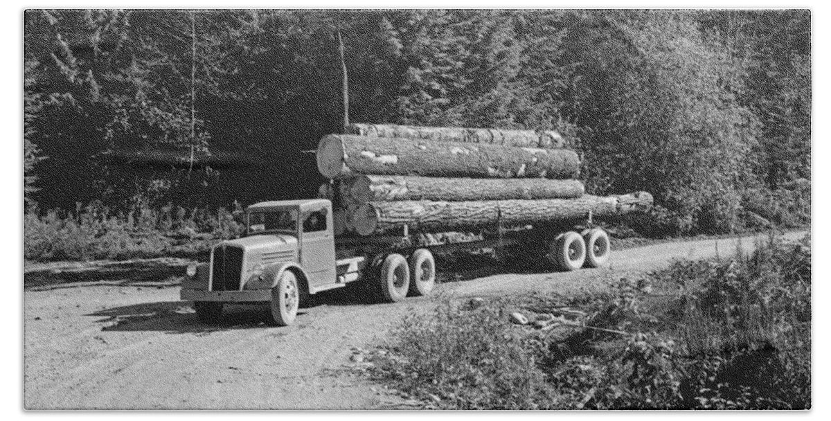 1940s Beach Towel featuring the photograph Logging Truck, C.1940s by H. Armstrong Roberts/ClassicStock