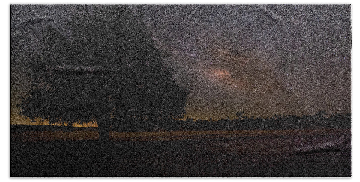 Dramatic Beach Towel featuring the photograph Lone Oak under the Milky Way by Tim Bryan