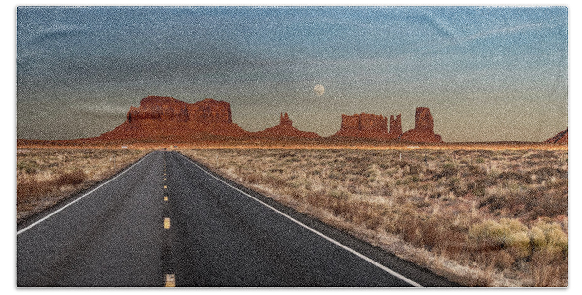 © 2018 Lou Novick All Rights Reserved Beach Towel featuring the photograph Moonrise over Monument Valley by Lou Novick