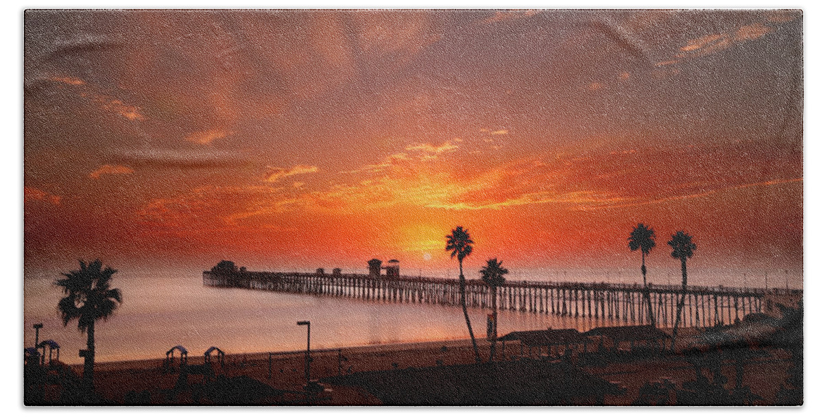  Sunset Beach Towel featuring the photograph Oceanside Sunset 9 by Larry Marshall