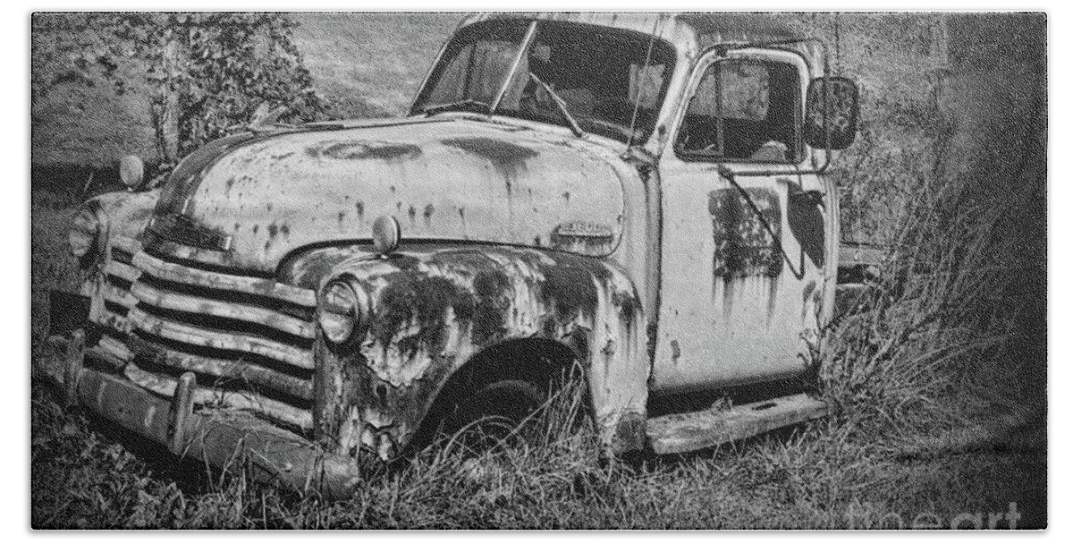Paul Ward Beach Sheet featuring the photograph Old Rusty Chevy in black and white by Paul Ward