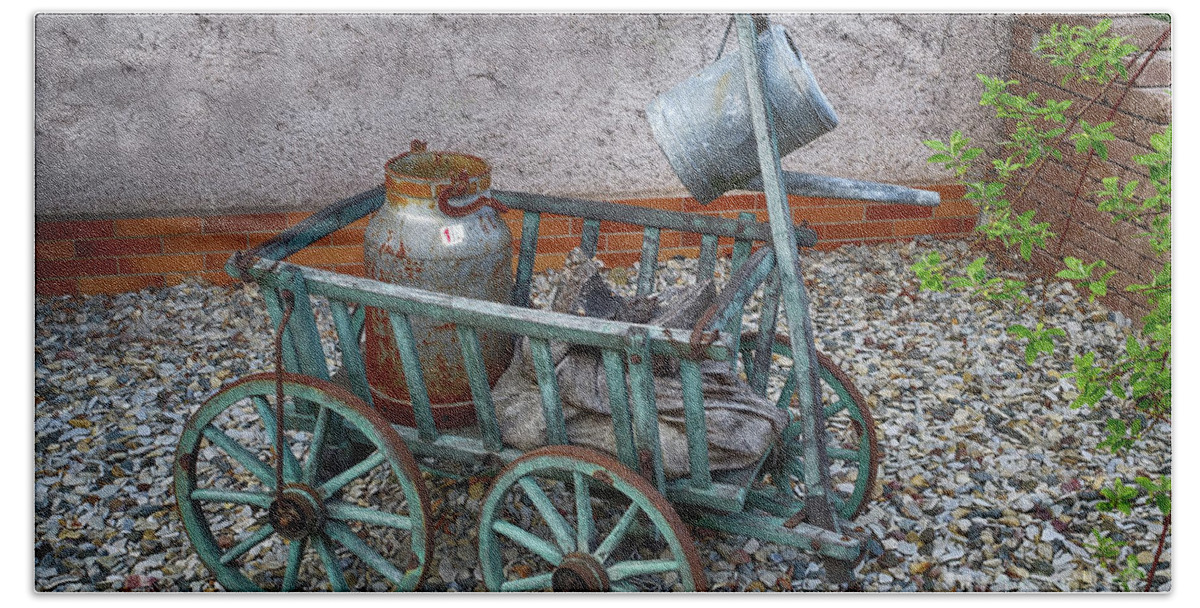 Wheelbarrow Beach Towel featuring the photograph Old wheelbarrow with milk churn by Eva-Maria Di Bella