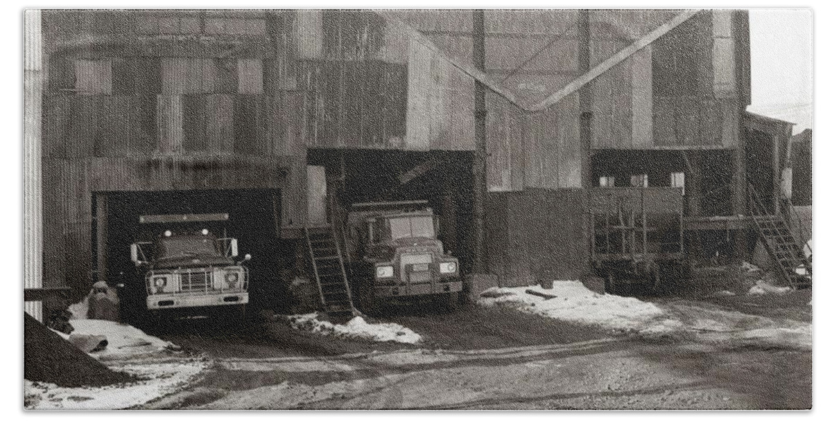 Olyphant Pa Beach Towel featuring the photograph Olyphant PA Coal Breaker Loading Trucks and Gondola Car Winter 1971 by Arthur Miller