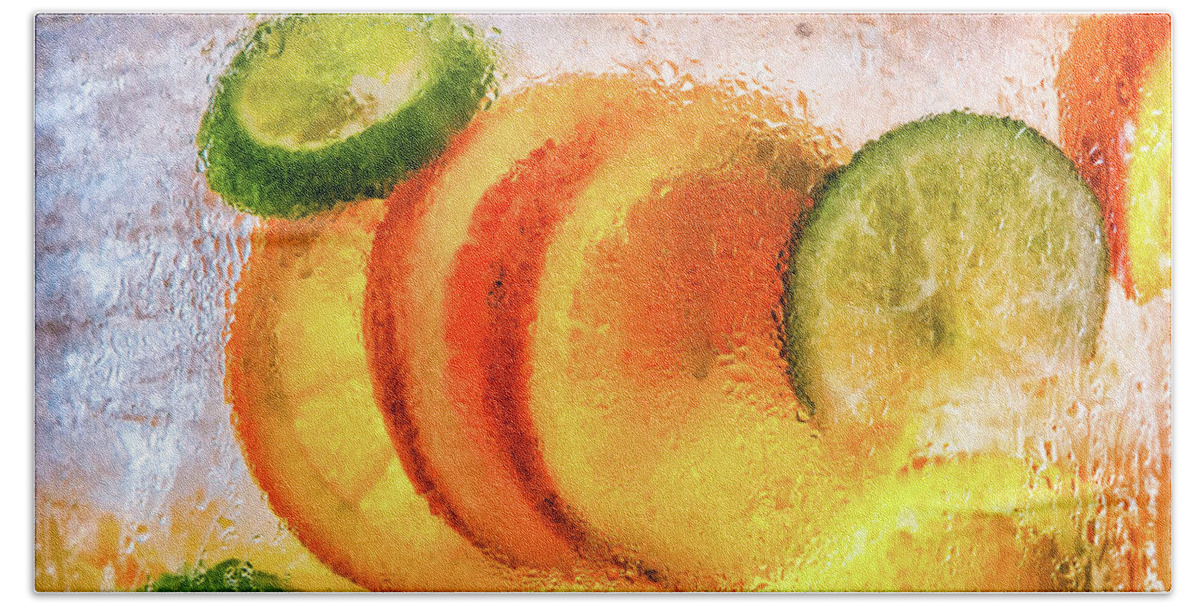 Beverage Beach Towel featuring the photograph Orange and Lime Slices in Water by Darryl Brooks