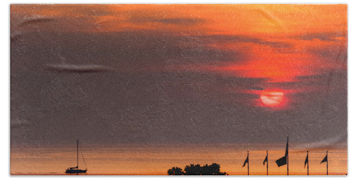 Sunset Beach Towel featuring the photograph Passing Through by Charles McCleanon