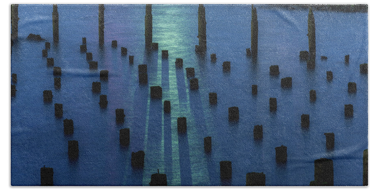 Abstract Beach Towel featuring the photograph Pilings and Ship Light by Robert Potts