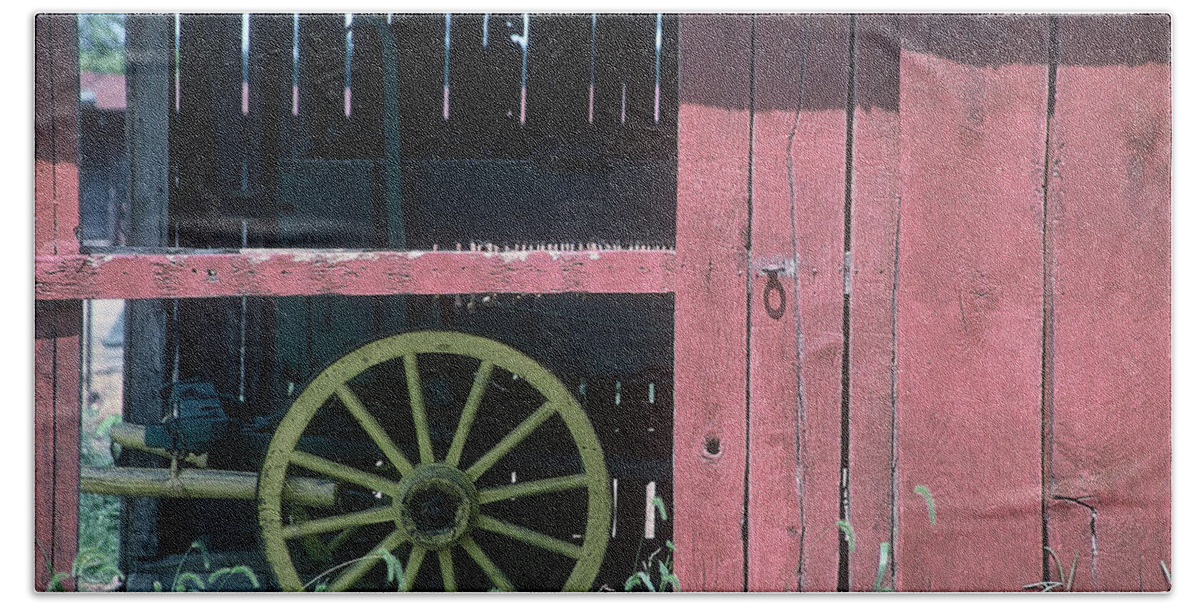 Amish Beach Towel featuring the pyrography Red Barn and Wagon Wheel by DArcy Evans