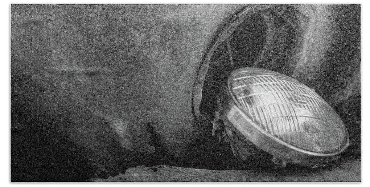 Automobile Beach Towel featuring the photograph Resting Headlight of Rusty Car by Dennis Dame