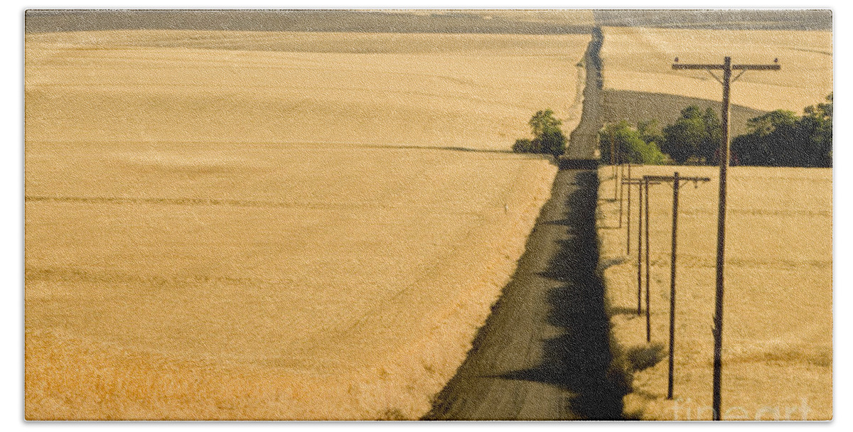 Road Beach Towel featuring the photograph Road Through Wheatfield by Inga Spence