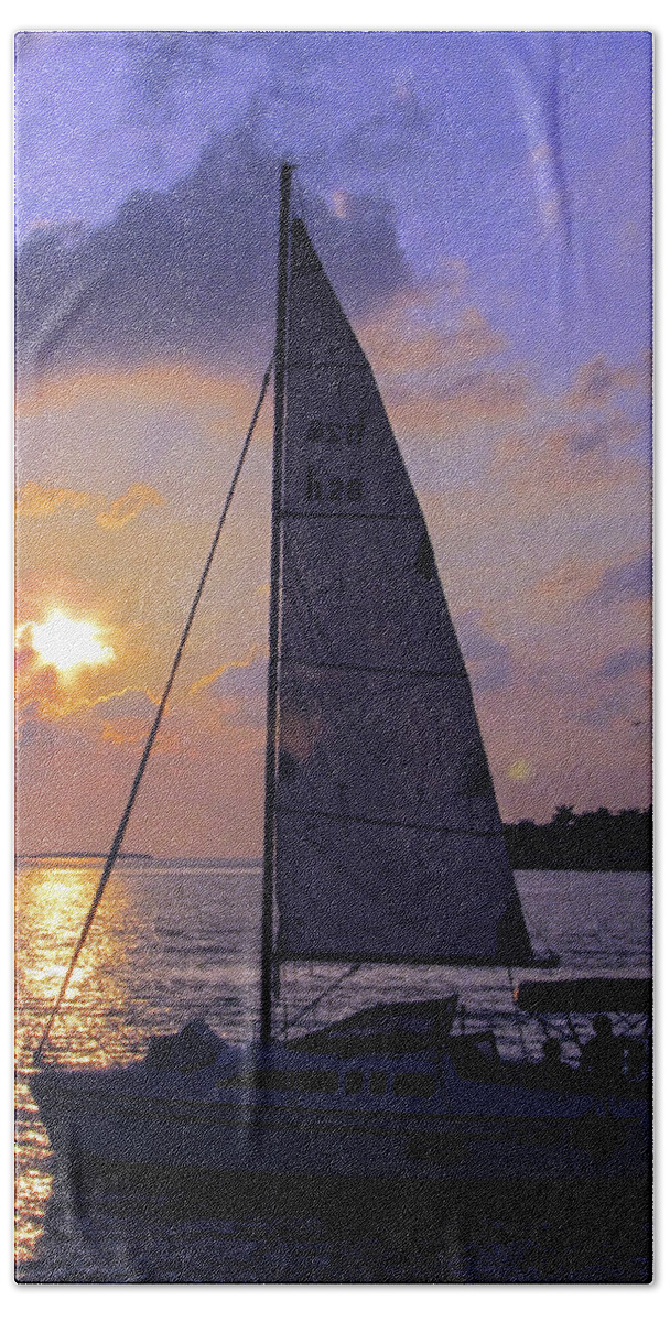 Sunset Beach Sheet featuring the photograph Sailing Home Sunset in Key West by Bob Slitzan