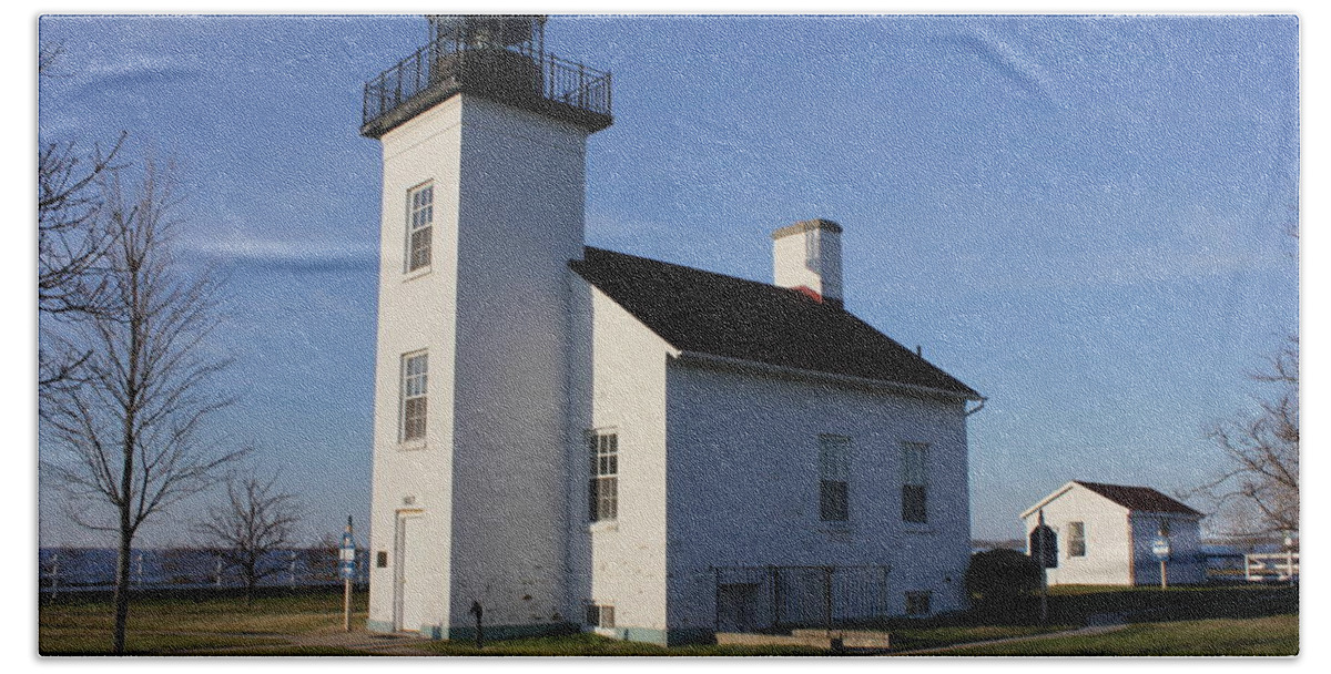 Light Beach Towel featuring the photograph Sand Point lighthouse in Escanaba by Charles and Melisa Morrison