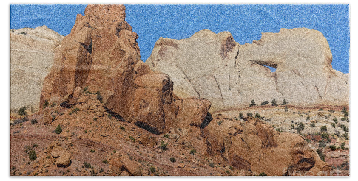00559230 Beach Towel featuring the photograph Sandstone Arch at Capitol Reef by Yva Momatiuk John Eastcott