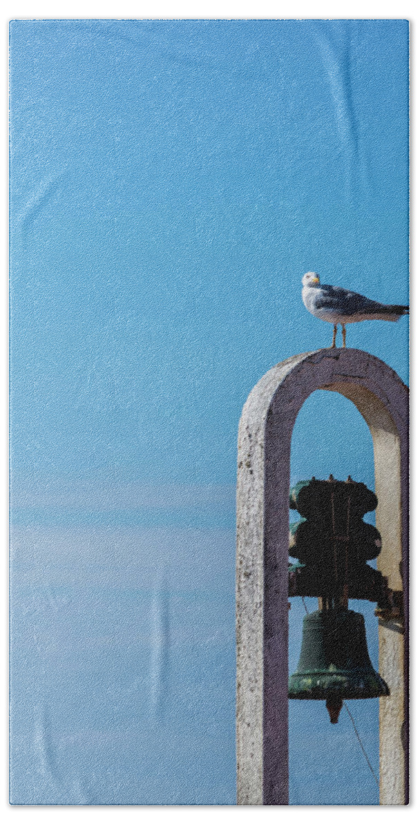 Animal Beach Towel featuring the photograph Seagull and the bell by Paulo Goncalves