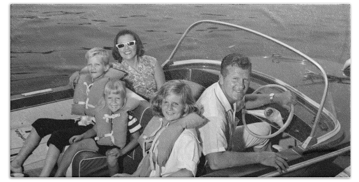 1960s Beach Towel featuring the photograph Smiling Family In Docked Boat, C.1960s by H. Armstrong Roberts/ClassicStock