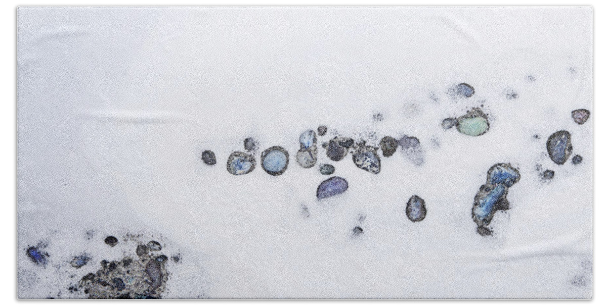 Theresa Tahara Beach Towel featuring the photograph Snow Pebbles Left by Theresa Tahara