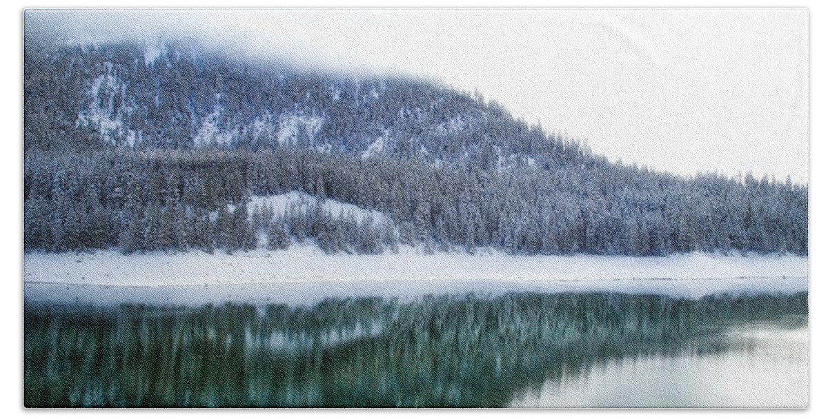 Snowy Trees On The Lake Beach Towel featuring the photograph Snowy trees on the lake by Lynn Hopwood
