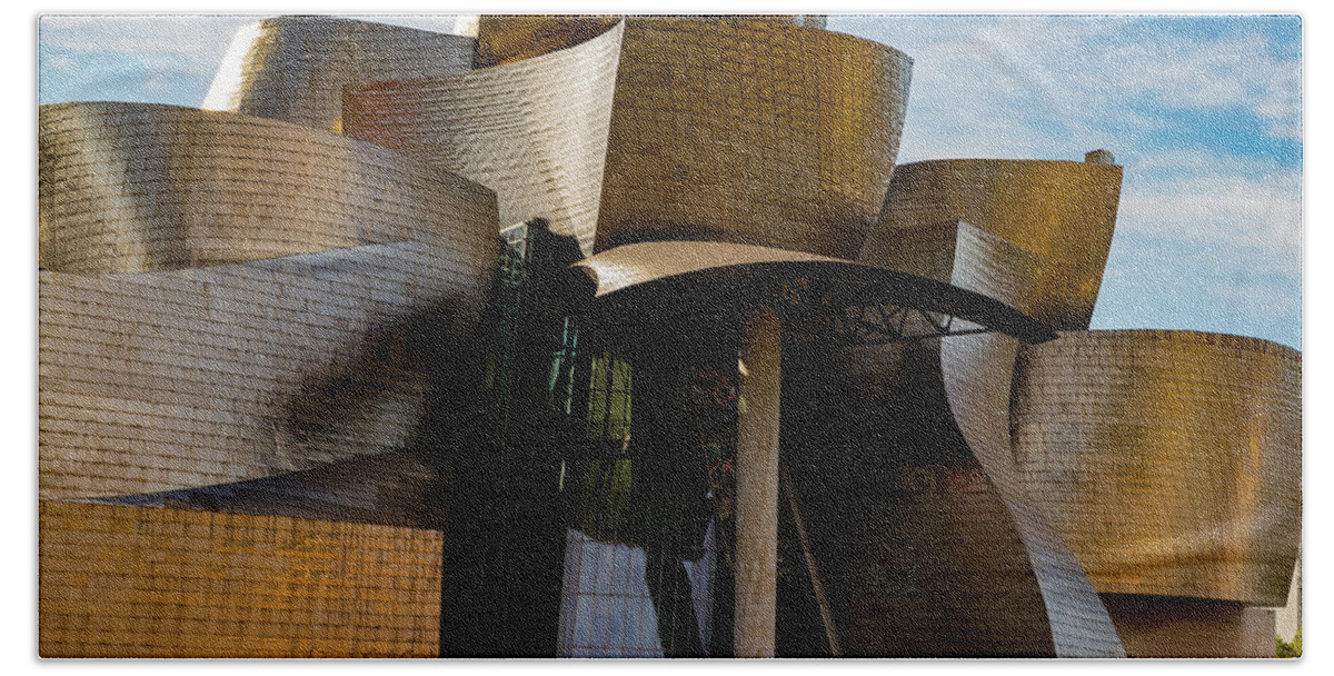 Spain Bilbao Guggenheim Museum Basque Country Frank Gehry Contemporary Architecture Nervion River City Daring And Innovative Curves Building Exterior Spectacular Building Deconstructivism Ferrovial Clad In Glass Beach Towel featuring the photograph The Guggenheim Museum Spain Bilbao by Andy Myatt