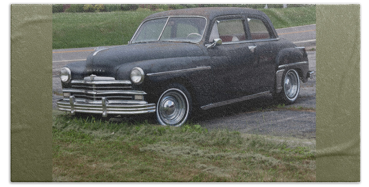 Photograph Beach Towel featuring the photograph 1948 Special Deluxe Plymouth by Suzanne Gaff