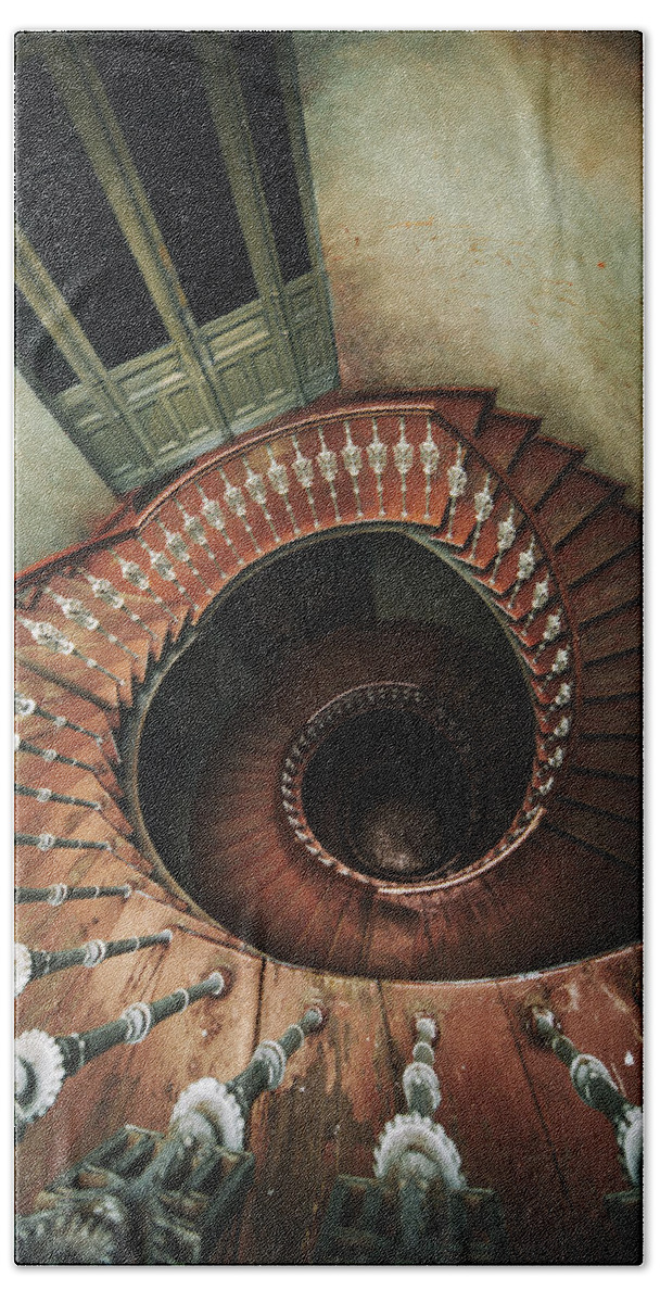 Spiral Beach Towel featuring the photograph Spiral staircase in red and brown tones by Jaroslaw Blaminsky