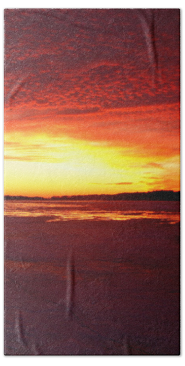 Sunset Beach Towel featuring the photograph Sunset over Frozen Lake Macatawa by Michelle Calkins