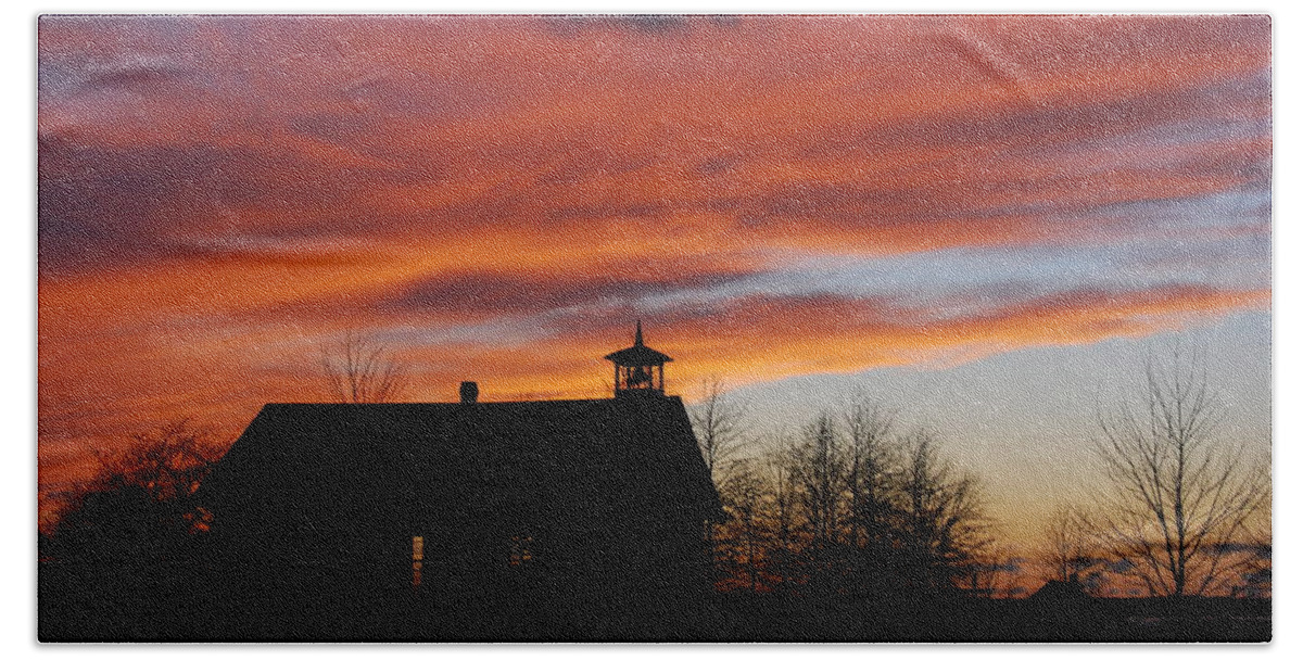 Sunset Beach Sheet featuring the photograph Sunsetting behind the historic Schoolhouse. by Wanda Jesfield
