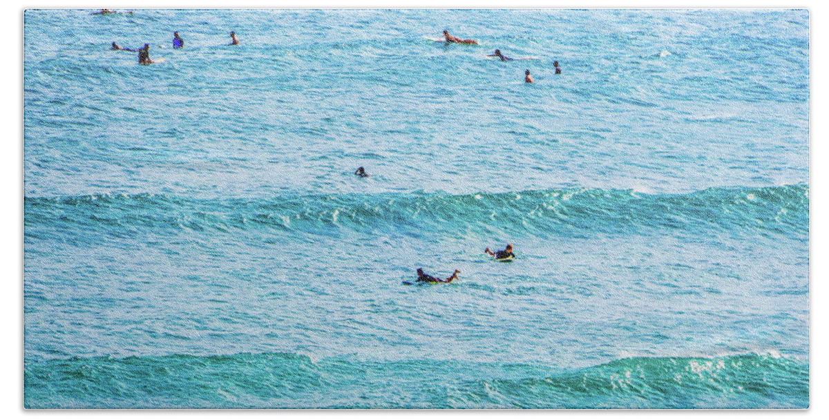 Surfers In The Pacific Ocean Beach Towel featuring the photograph Surfers In The Ocean by Jera Sky