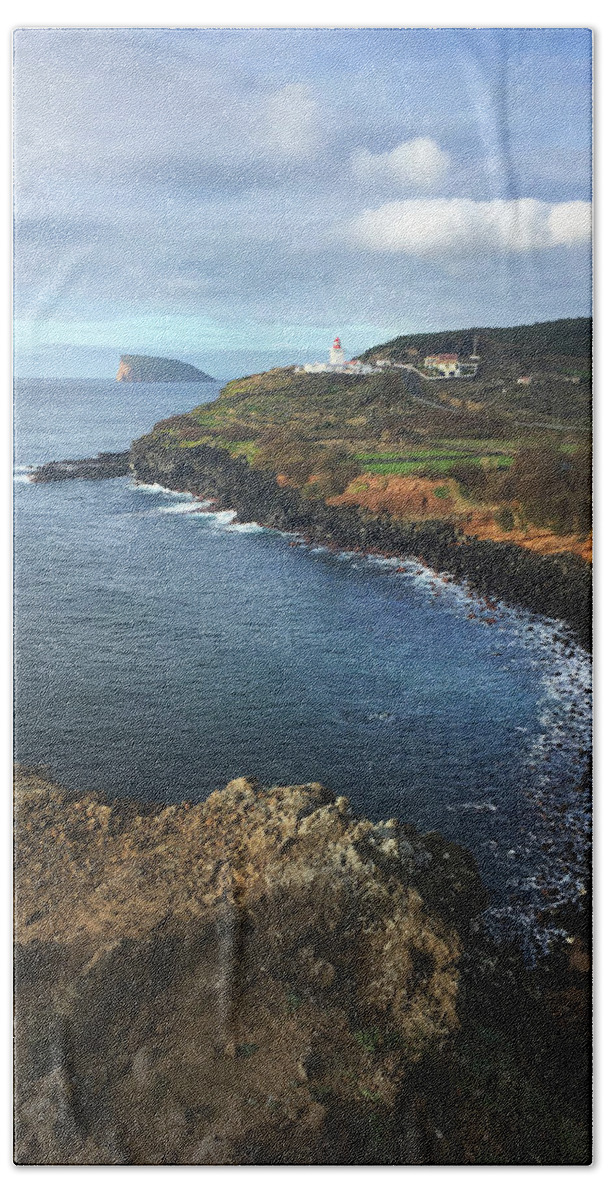 Kelly Hazel Beach Towel featuring the photograph Terceira Island Coast with Ilheus de Cabras and Ponta das Contendas Lighthouse by Kelly Hazel