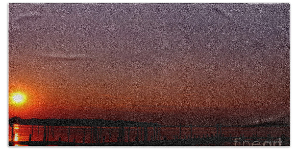 Clay Beach Towel featuring the photograph The Sun Sets Over The Water by Clayton Bruster