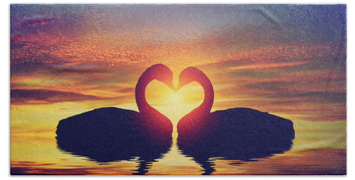 Swan Beach Towel featuring the photograph Two swans making a heart shape at sunset. Valentine's day by Michal Bednarek