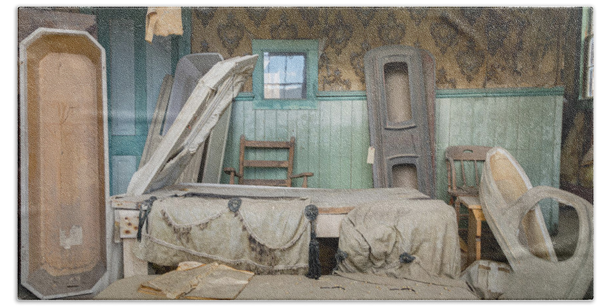 Abandoned Beach Towel featuring the photograph Western frontier town morgue by Karen Foley