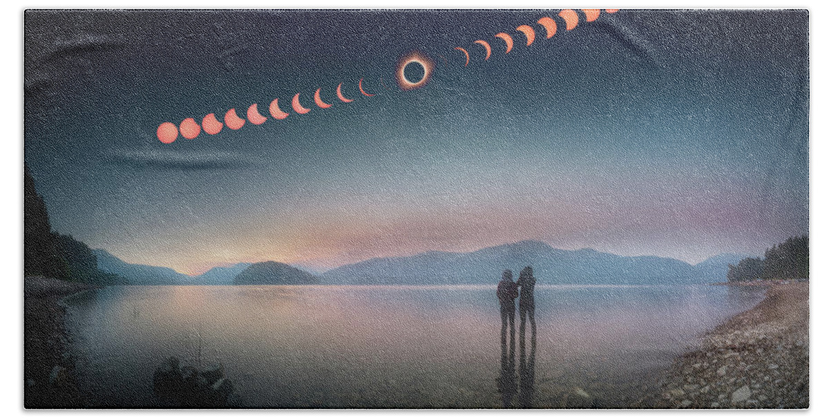 2017 Beach Towel featuring the photograph Woman and girl standing in lake watching solar eclipse by William Lee