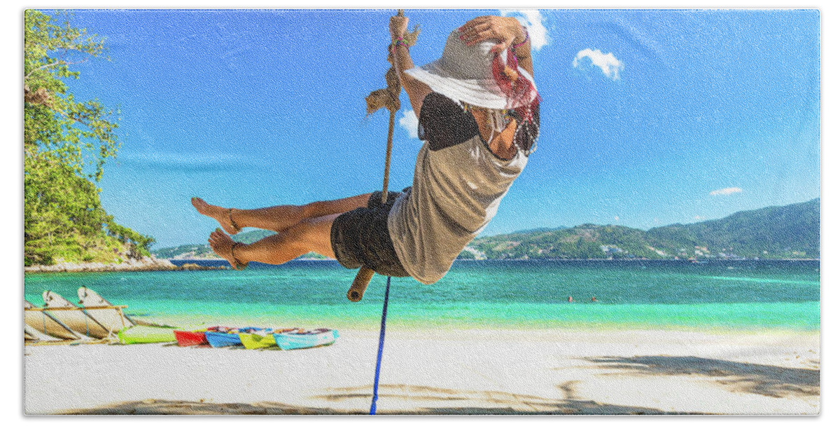 Woman Beach Towel featuring the photograph Woman swinging on the beach by Benny Marty